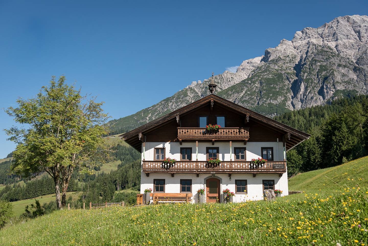 Naturhotel Forsthofgut mit Glockenturm