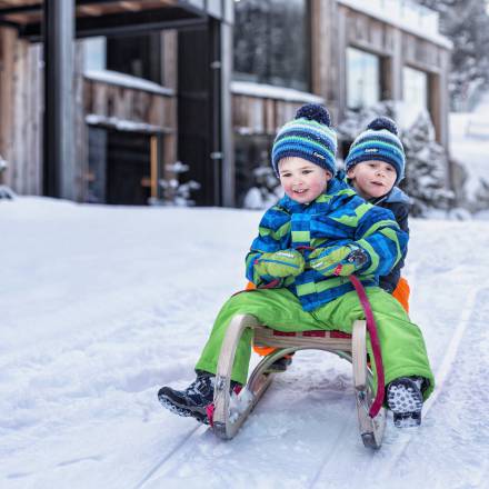 Sledding fun for kids - Naturhotel Forsthofgut