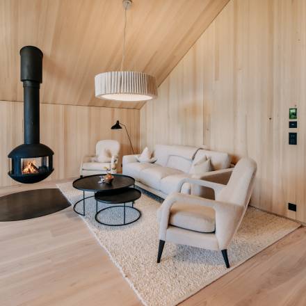 Garden loft with a floating fireplace in the Naturhotel Forsthofgut