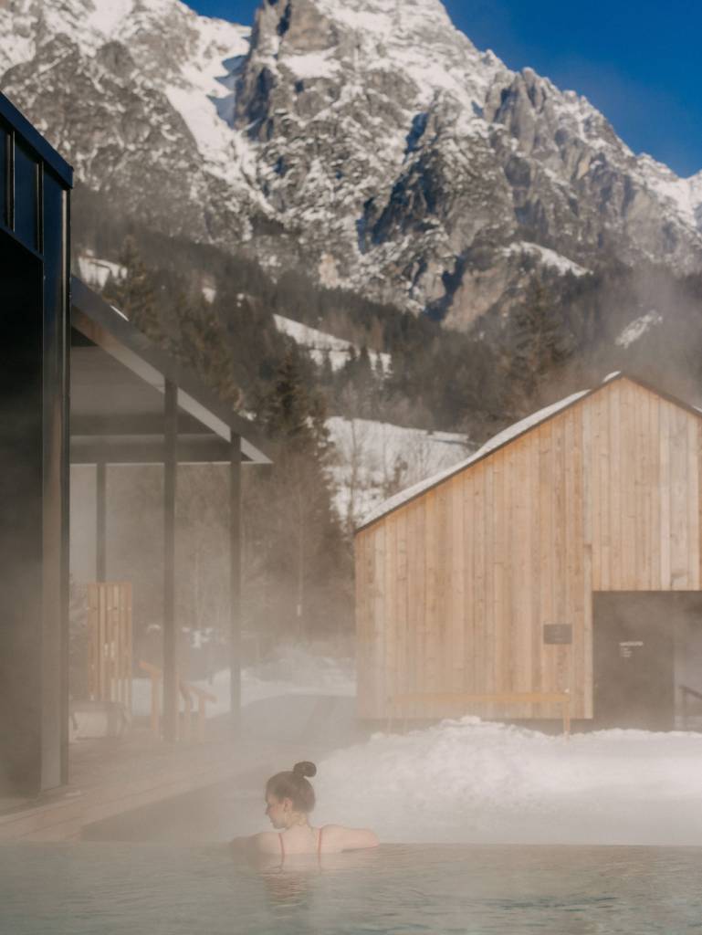 Enjoy wellness and sun - outdoor pool at the spa hotel Forsthofgut in Austria 