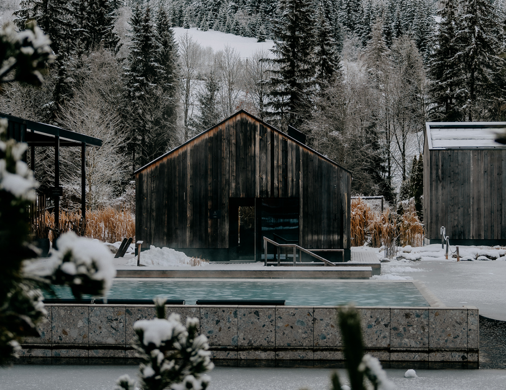 The heated lake pool with views of the snowy landscape.